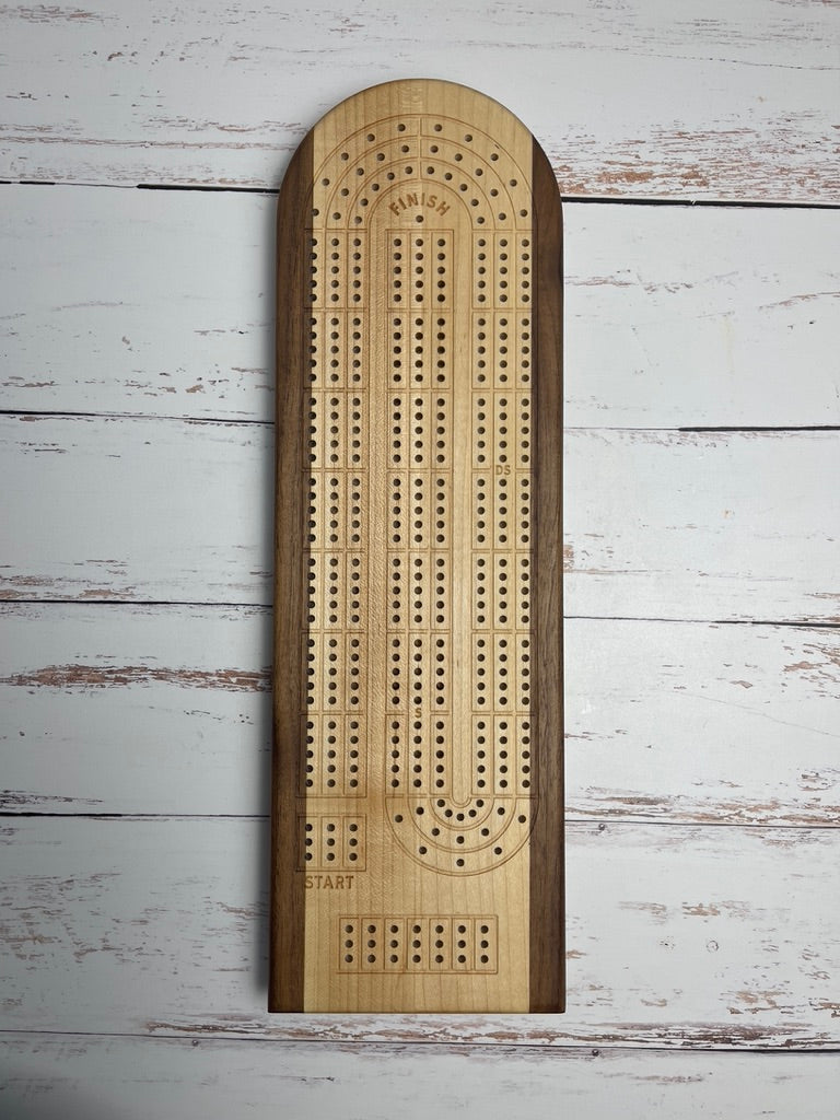 Cribbage board - walnut around a maple center