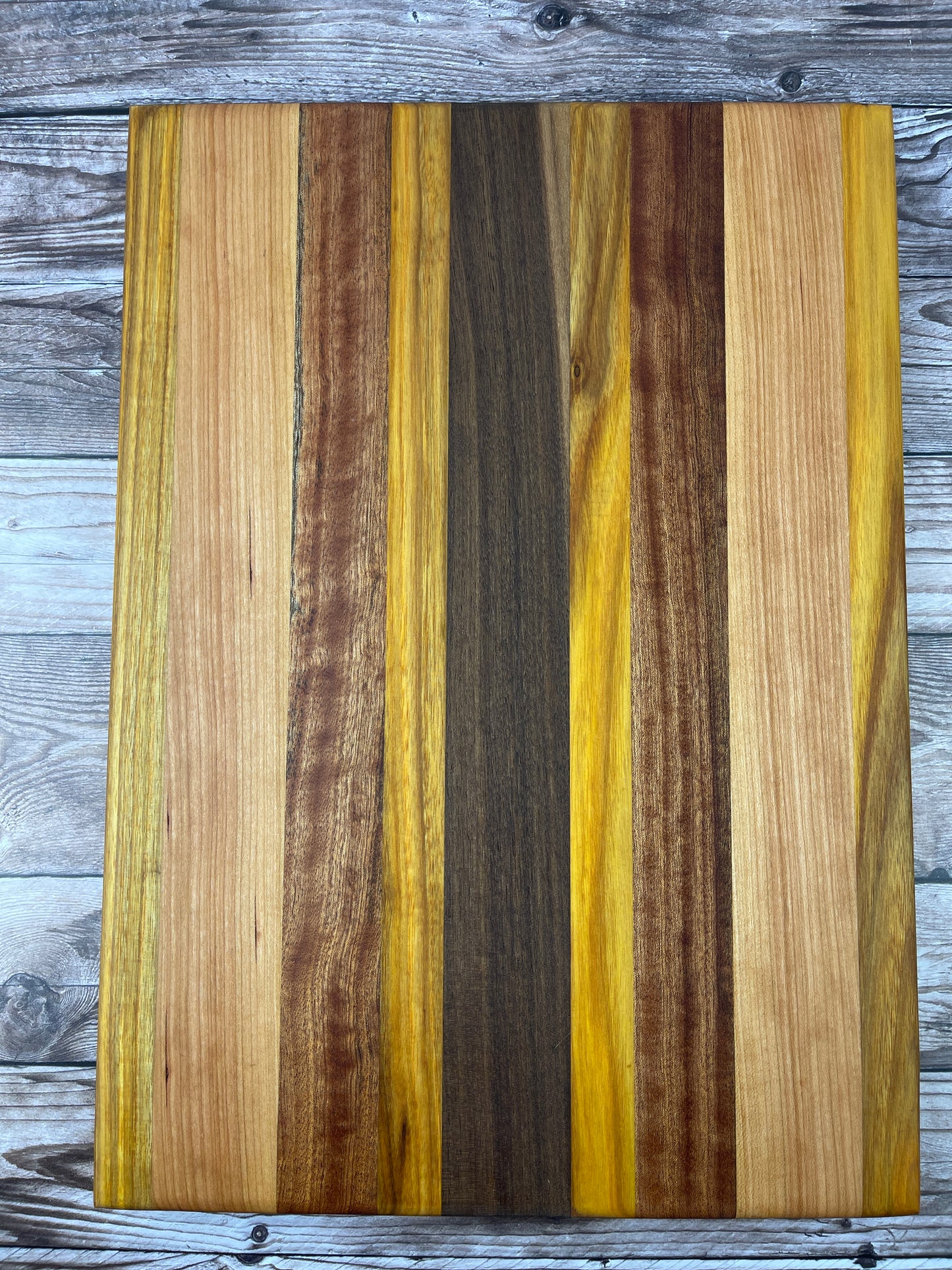 Cutting Board: Canarywood, Cherry, Sapele, Canarywood, Walnut