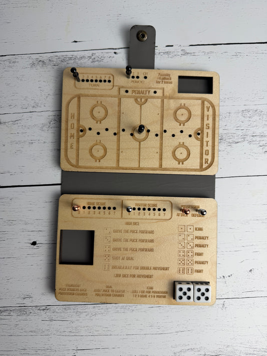 Laser-engraved maple folding dice hockey game with peg scoring track and printed rules — Bees Boards
