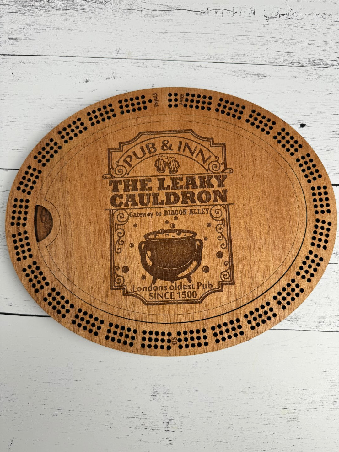 The Leaky Cauldron pub cribbage board