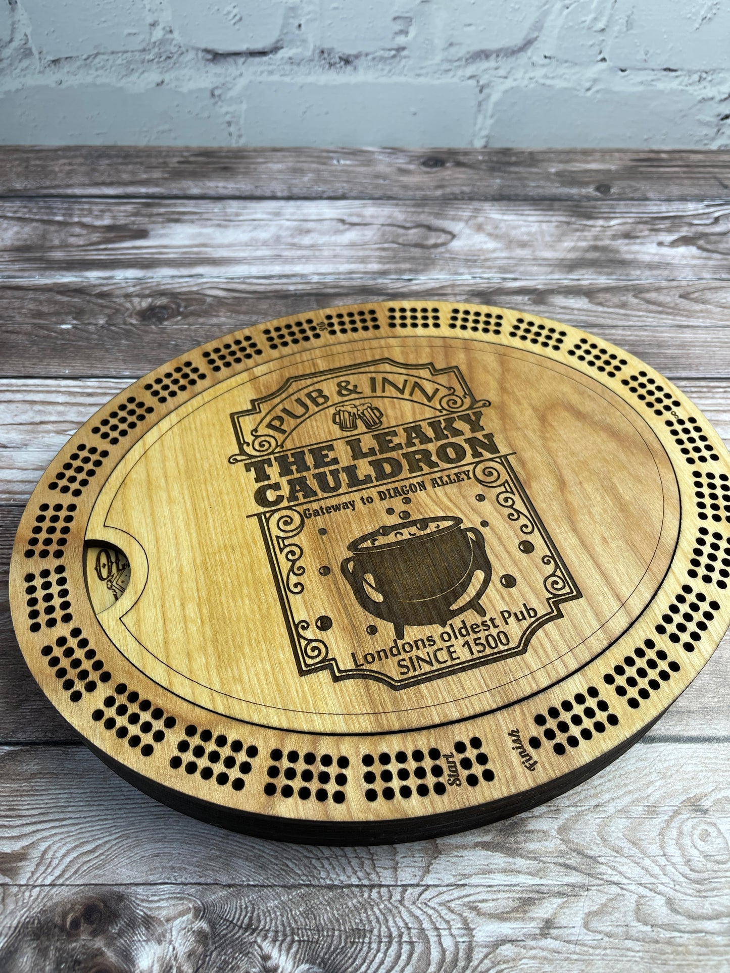 The Leaky Cauldron pub cribbage board